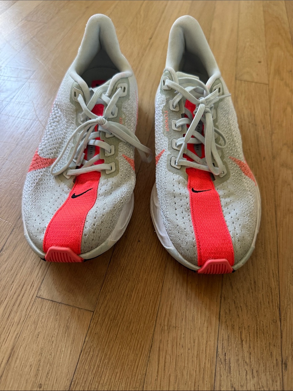 Nike Women’s Athletic Shoes - White with Neon Coral Stripe